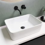 white ceramic sink with stainless steel faucet